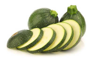 Fresh Round Zucchini's and a cut one clipart