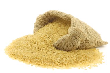 Bir çuval bezi çanta cilasız pirinç (bütün tahıl)