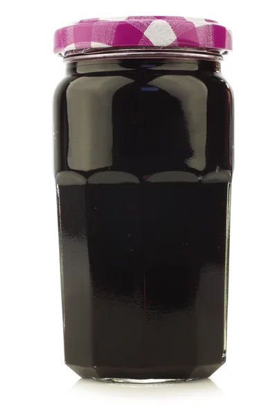 Glass jar with fruit jam — Stock Photo, Image
