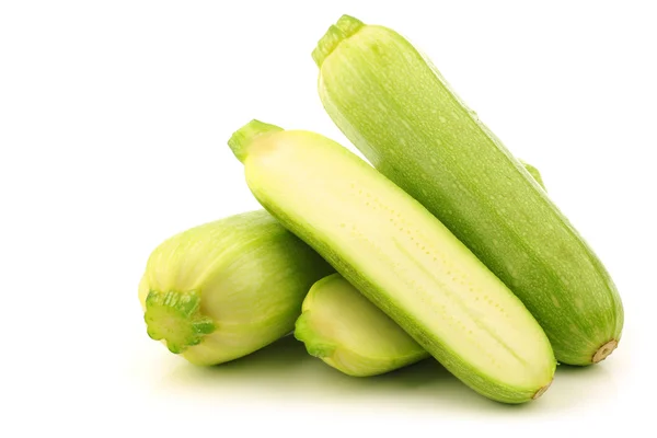 Light green zucchini's and a cut one — Stock Photo, Image