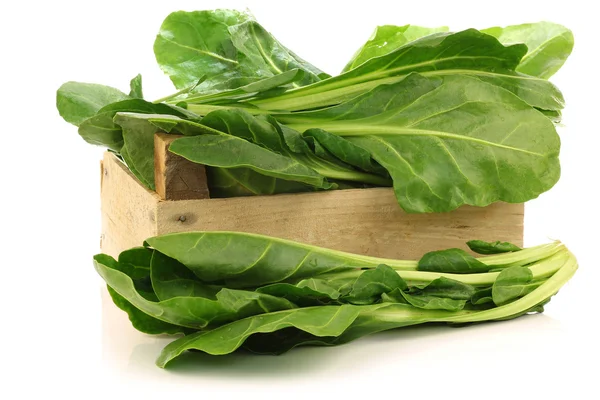 Chinese spinach (Ipomoea aquatica) in a wooden crate — Stock Photo, Image