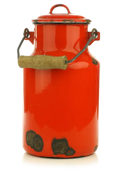 Vintage red enamel milk can — Stock Photo, Image