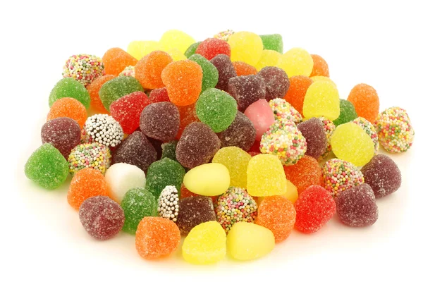 Красочные конфеты на животе — стоковое фото
