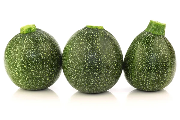 Three fresh Round Zucchini 's — стоковое фото