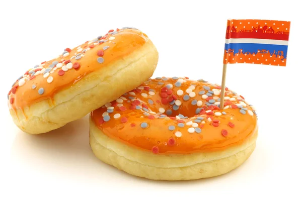 stock image Orange donuts with red,white and blue sprinkles and flag toothpicks