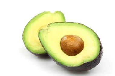 Two avocado halves laying side by side clipart