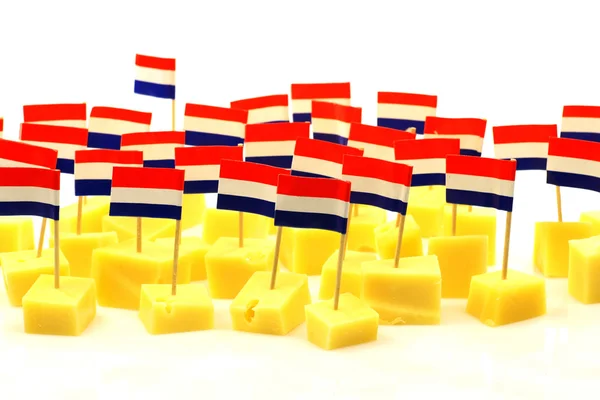 Blocks of Dutch cheese with Dutch flag toothpicks — Stock Photo, Image