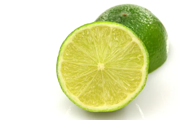 Two lime fruit halves — Stock Photo, Image