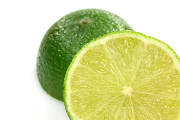 Two lime fruit halves — Stock Photo, Image