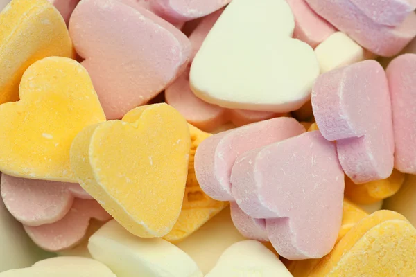 Kolorowe cukierki w kształcie serca — Zdjęcie stockowe