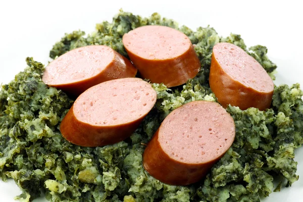 Close up of pieces of smoked sausage — Stock Photo, Image