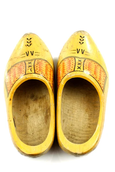 Par de zapatos holandeses tradicionales de madera amarilla —  Fotos de Stock