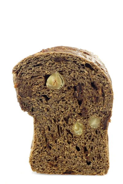 Pão integral com correntes e avelãs — Fotografia de Stock