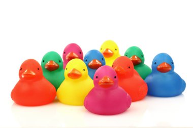 Colorful plastic ducklings clipart
