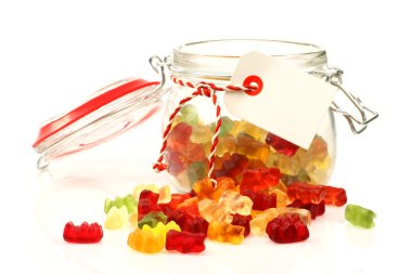 Glass jar with colorful gummy bears with room four your text or images clipart