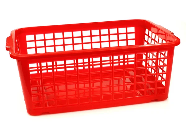 Красная пластиковая корзина — стоковое фото