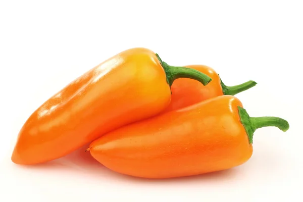 Fresh orange peppers — Stock Photo, Image
