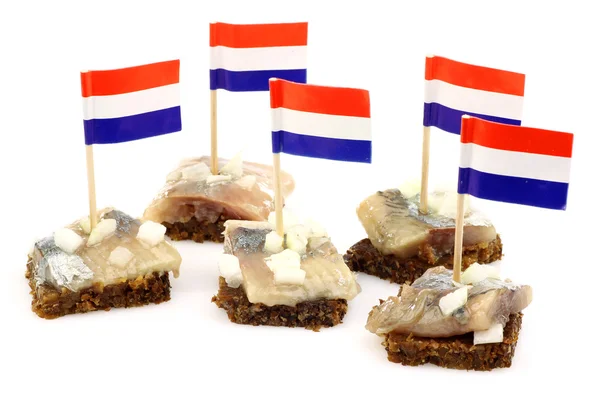 Fresh herring (Dutch "Hollandse Nieuwe") with chopped onions — Stock Photo, Image