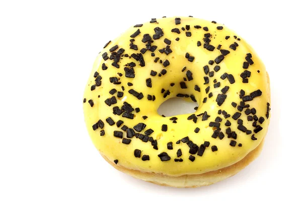 Donut de vidro amarelo e polvilhado — Fotografia de Stock