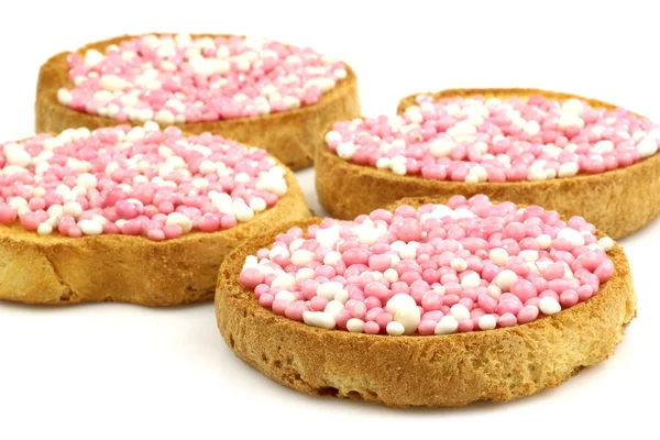 面包与白色和粉红色茴香种子洒 — 图库照片