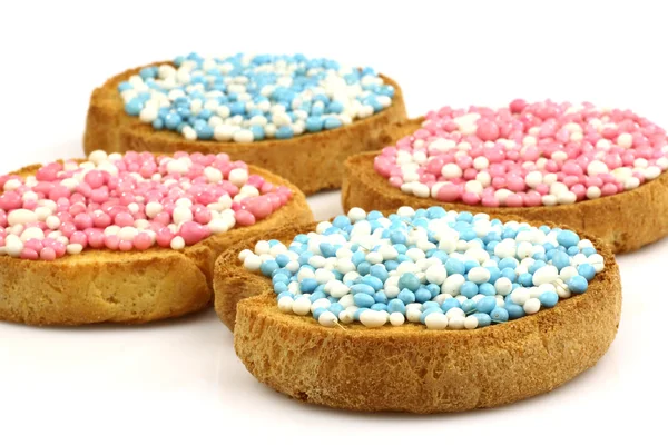 stock image Rusks with white and blue and white and pink anise seed sprinkles