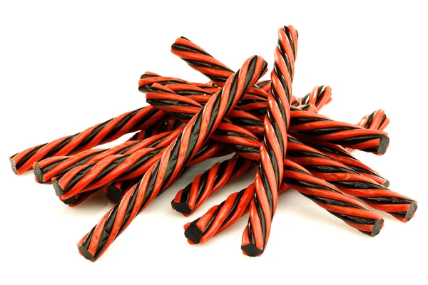 Rote und schwarze Süßholzbonbons — Stockfoto