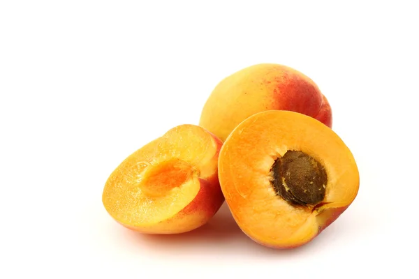 Fresh colorful apricot an two halves — Stock Photo, Image