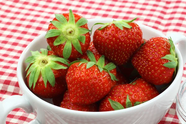 Strawberries in a white bowl — Stock Photo, Image