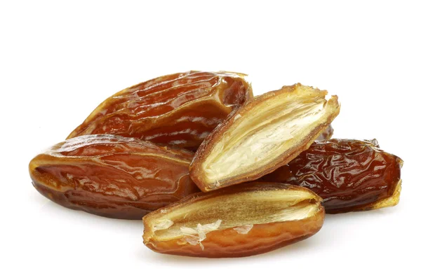 Date fruit and a cut one — Stock Photo, Image