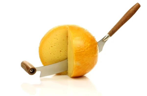 Cheese knife with some cut pieces of Dutch Edam cheese — Stock Photo, Image