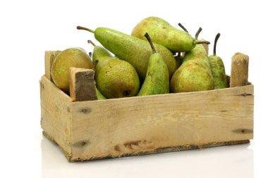 Fresh juicy pears in a wooden box clipart