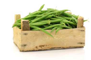 Bunch of green beans in a wooden box