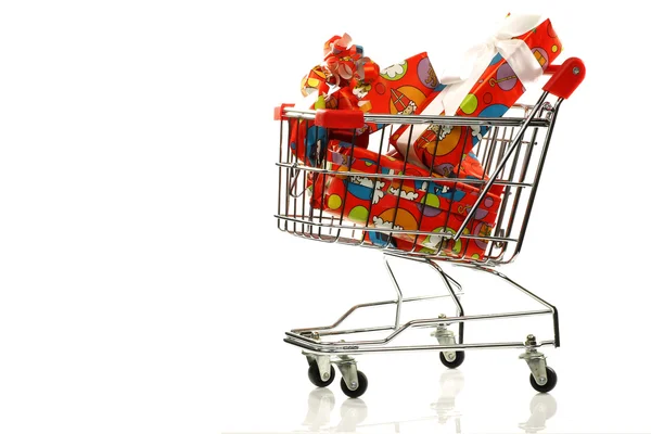 Shopping cart with colorful wrapped "Sinterklaas"presents — Stock Photo, Image