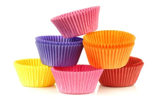 Bicchieri di muffin vuoti impilati colorati — Foto Stock