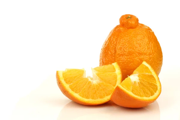 stock image One fresh minneola and some slices