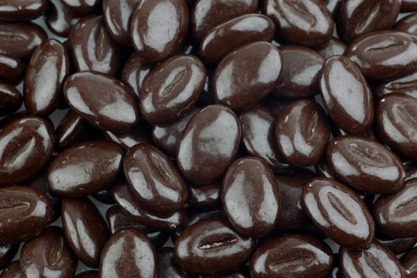 Background of chocolate coffee beans — Stock Photo, Image