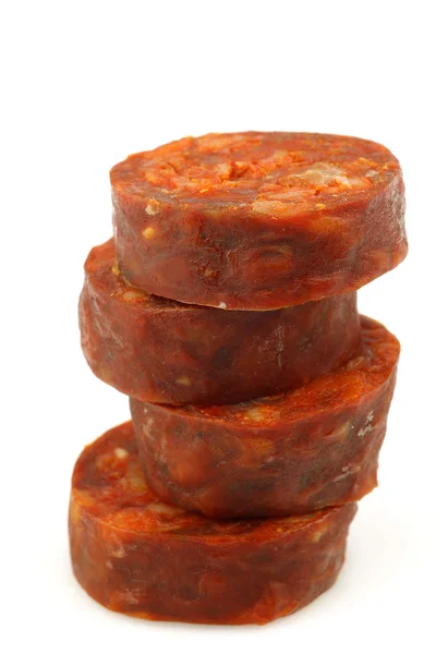 Mucchio di pezzi di salsiccia chorizo tagliati — Foto Stock