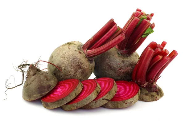Three beetroots with part of foliage — Stock Photo, Image
