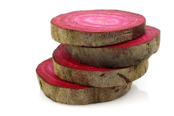 Stacked fresh slices of cut beetroot — Stock Photo, Image