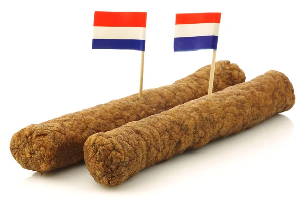 Twee Nederlandse snacks genaamd "fricandel" met Nederlandse vlag tandenstokers — Stockfoto