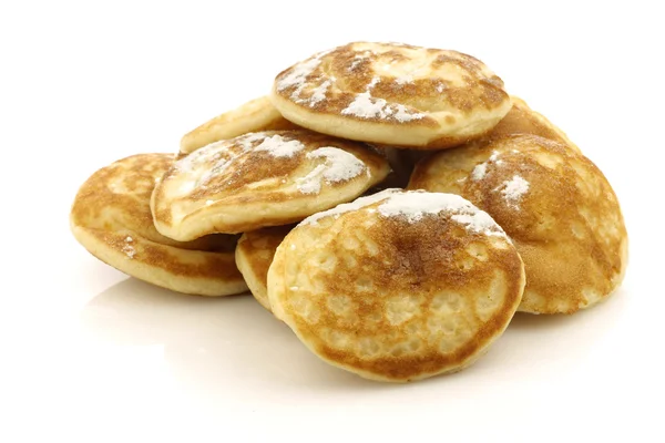Freshly baked traditional Dutch mini pancakes called "poffertjes — Stock Photo, Image