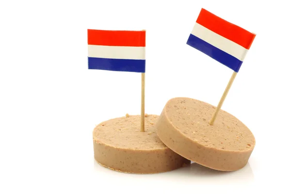 Pieces of traditional Dutch liver sausage with a Dutch flag toothpick — Stock Photo, Image
