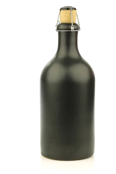 Grey ceramic beer bottle with a cork — Stock Photo, Image