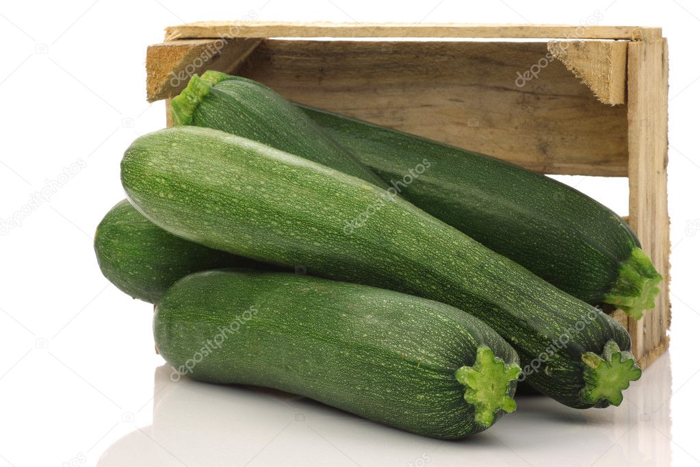 Fresh zucchini's in a wooden box