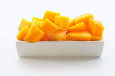 Mango Cubes on a white dish 01 clipart