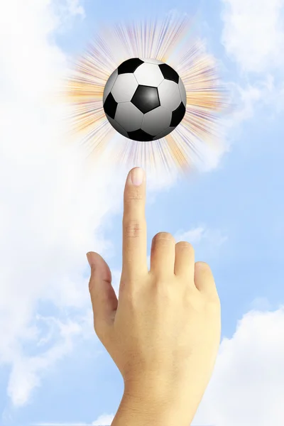 Mano y una pelota de fútbol —  Fotos de Stock