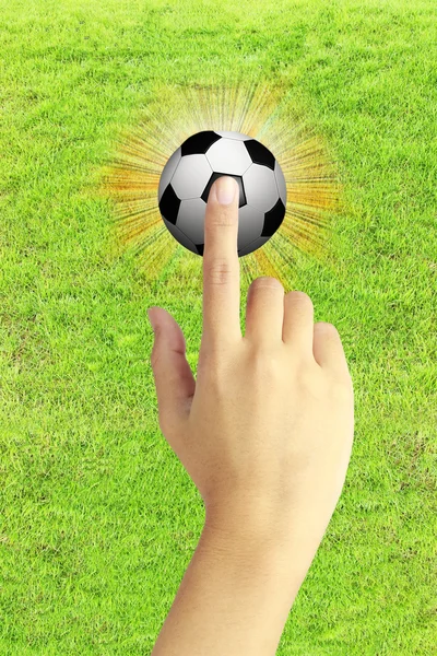 Mano e un pallone da calcio — Foto Stock