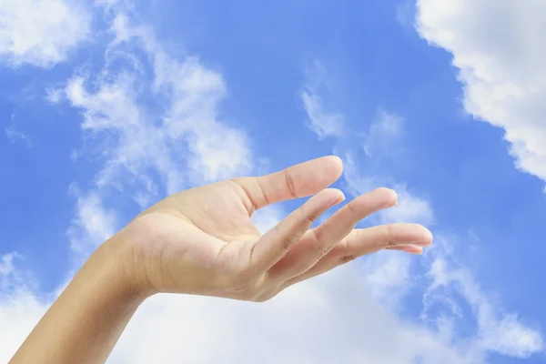 stock image Empty hand palm on blue sky.