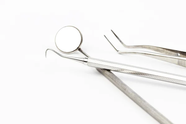 Set medizinischer Geräte aus Metall für die Zahnpflege — Stockfoto