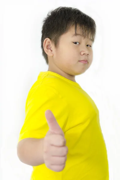 Chlapec s palce nahoru nad bílým pozadím — Stock fotografie